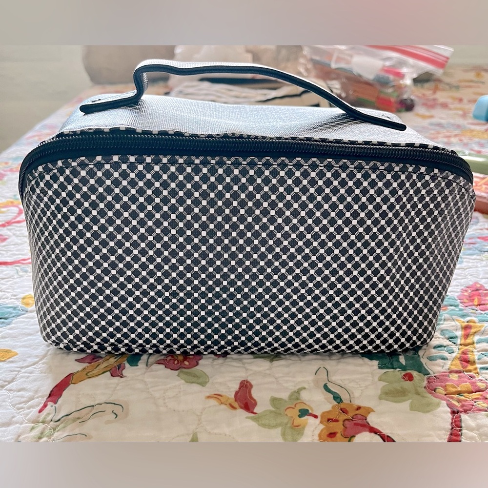 Black & white PVC soft train case, NWOT.